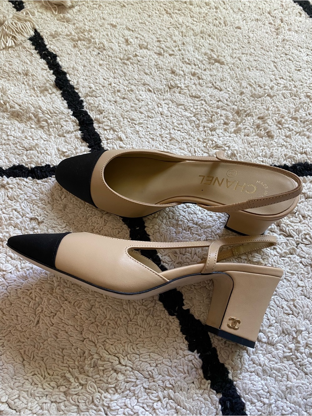 CHANEL Beige and Black Cap-Toe Slingback Heels